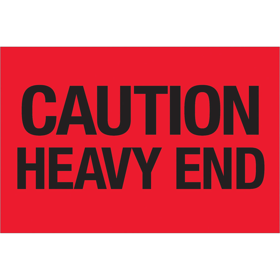 High-visibility fluorescent red shipping labels alert handlers to heavy items and proper handling requirements. Each 2x3" label features bold black text on semi-gloss coated paper for durability and professional appearance. Roll of 500 labels per order.