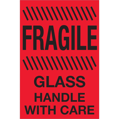 High-visibility 4x6" fragile glass handling labels in internationally recognized fluorescent red. Printed on durable semi-gloss coated paper with 500 labels per roll. Perfect for shipping coordinators managing glass and delicate freight with compliance visibility.