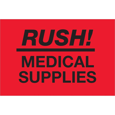 High-visibility 2x3" fluorescent red rush labels designed for medical supply shipments requiring immediate handling attention. Printed on semi-gloss coated paper for durability and professional appearance. Sold as a roll of 500 labels with compatible tabletop and wall-mount dispensers available.