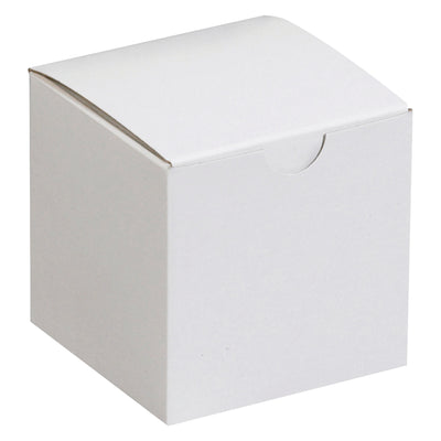 Case of 100 white fibreboard gift boxes (3x3x3") with one-piece construction that ships and stores flat. Gray interior, quick setup. Ideal for retail goods, candles, and small product packaging at wholesale pricing.