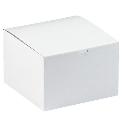 White fibreboard gift boxes with one-piece construction that sets up fast and ships flat–ideal for retail goods and gift packaging. 6"  6"  4" dimensions, sold as a case of 100 units. Gray interior protects contents while white exterior delivers professional presentation.