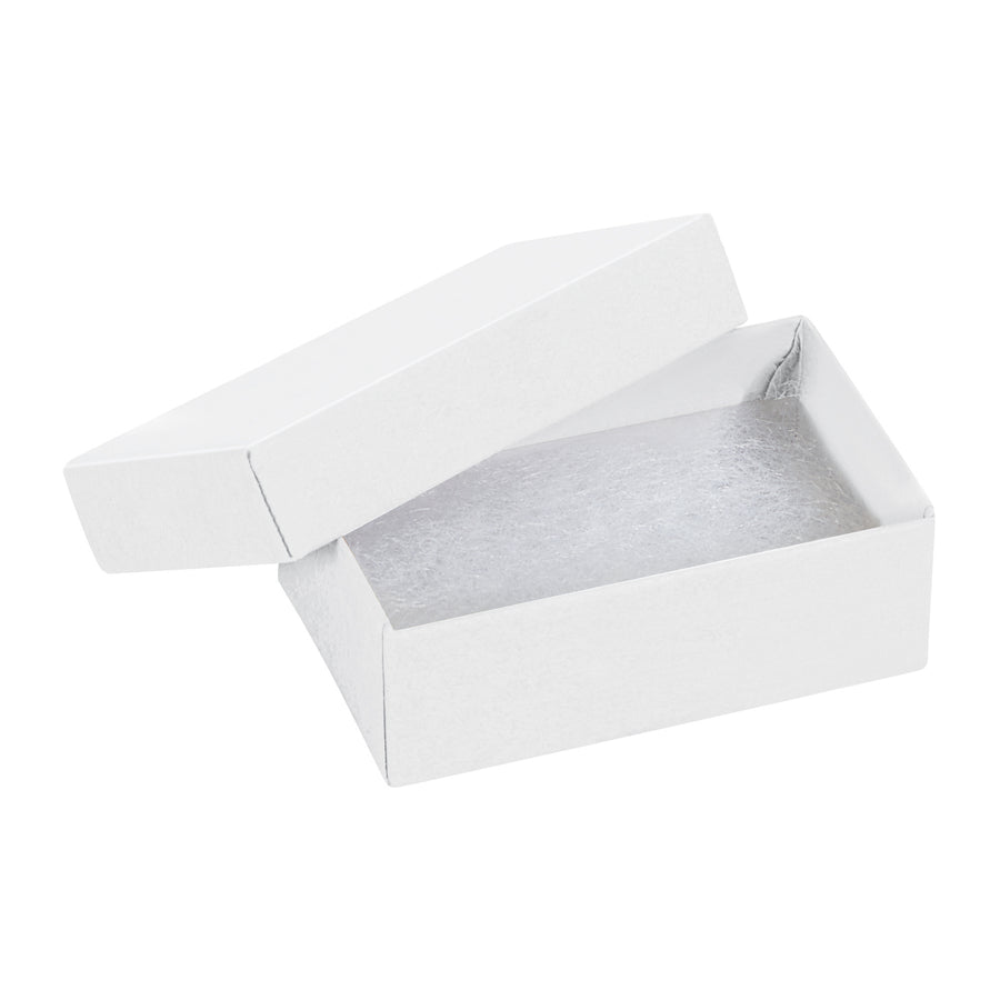Professional-grade white jewelry boxes measuring 2.5" x 1.5" x 0.875" built from rigid fibreboard with jeweler's cotton filler included. Two-piece construction arrives fully assembled, ready to pack. Purchase by the case of 100 units for maximum cost efficiency.