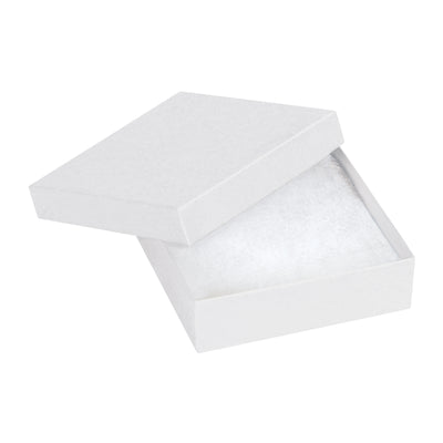 Professional-grade white jewelry boxes perfect for retail and wholesale jewelry operations. Pre-assembled rigid fibreboard construction with jeweler's cotton lining–ready to pack and ship immediately. Case of 100 units, 3.5" x 3.5" x 1" dimensions.