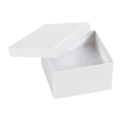 Pre-assembled white jewelry boxes built to ship safely and impress customers. Each 3.5x3.5x2" box features rigid fibreboard construction with non-tarnishing jeweler's cotton insert. Order by the case (100 units) and reduce packaging costs without sacrificing quality or durability.