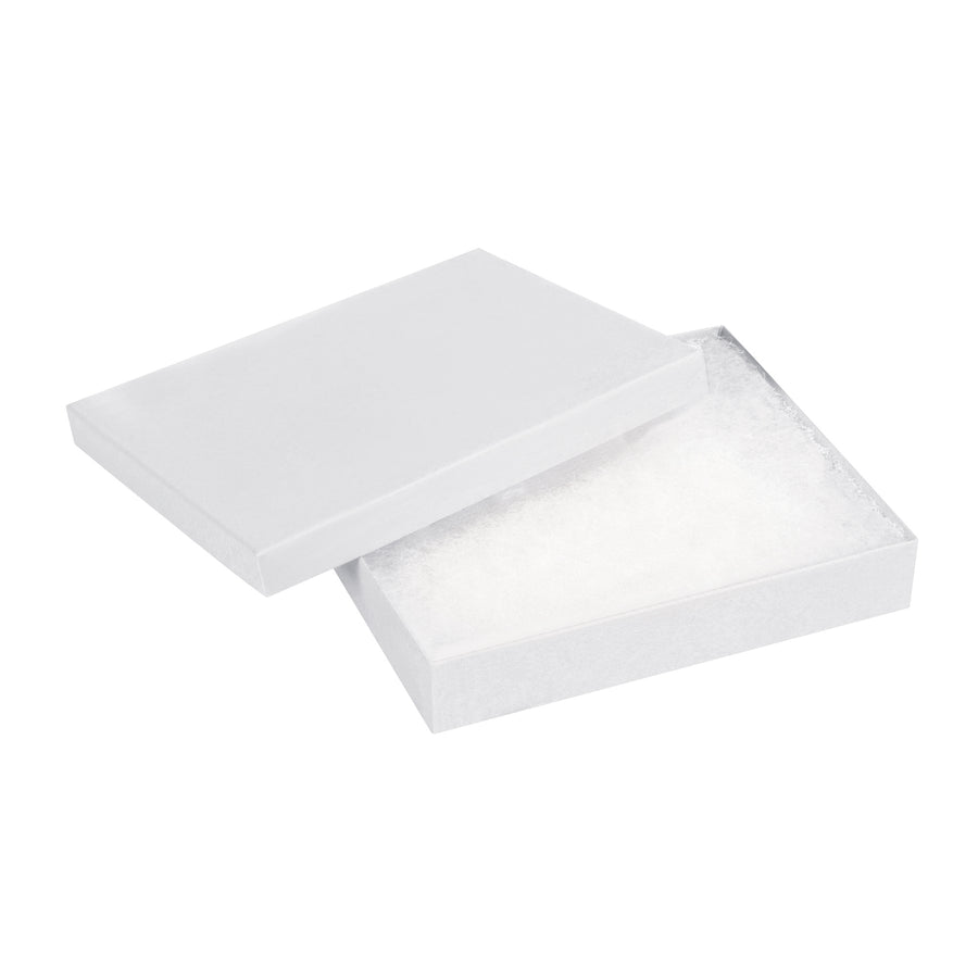 Save assembly time with fully assembled 6x5x1 white jewelry boxes constructed from rigid fibreboard. Each case includes 50 two-piece boxes pre-filled with non-tarnishing jeweler's cotton–perfect for retail necklaces and premium small items. Durable chipboard cartons designed for professional presentation and secure shipping.
