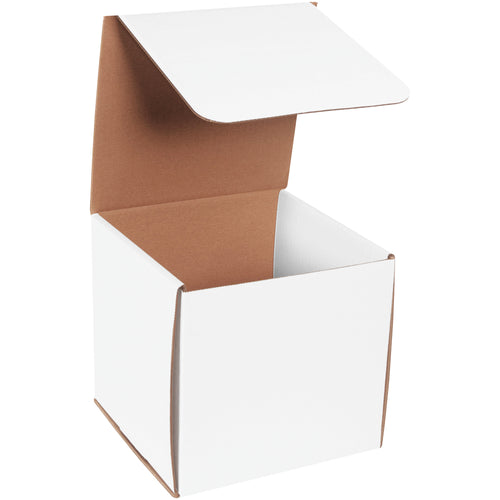 Heavy-duty ECT-32-B white corrugated mailers engineered for small parcel protection without tape or glue. One-piece fold-and-tuck design delivers double-wall crush resistance on front and sides. 8