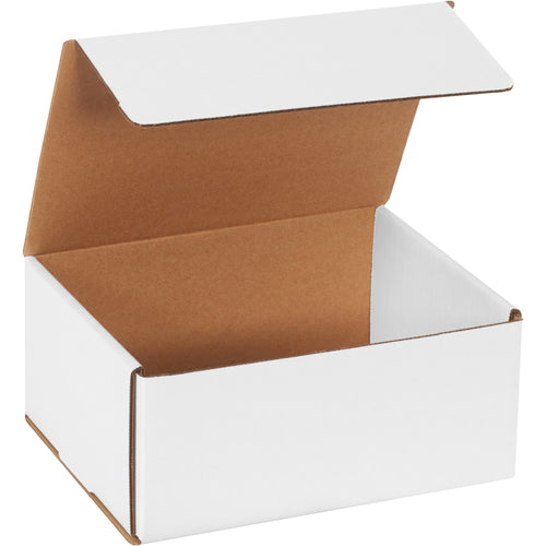 Heavy-duty ECT-32-B white corrugated mailers designed for small parcel shipping. These one-piece folding mailers feature crush-resistant double walls, require no tape or glue, and ship 50 per bundle to maximize freight efficiency and reduce per-unit costs.