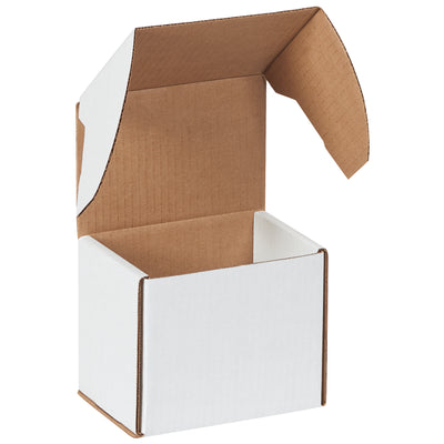 Professional white outside tuck mailers with self-locking tabs eliminate tape waste and shipping delays. Made from durable ECT-32-B corrugated, these 5 5/8x4 3/16x5 mailers protect contents while presenting a polished brand image. Sold as bundle of 50 flat-shipped cartons.