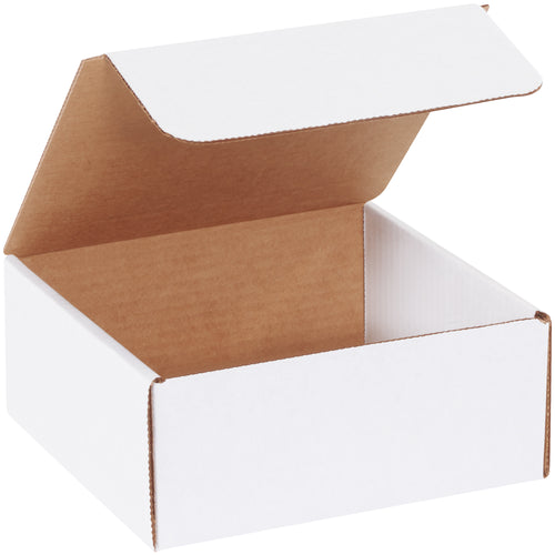 Professional white corrugated literature mailers designed for e-commerce brands shipping catalogs, brochures, and promotional materials. Pre-sized 7.5 x 7 x 3.25