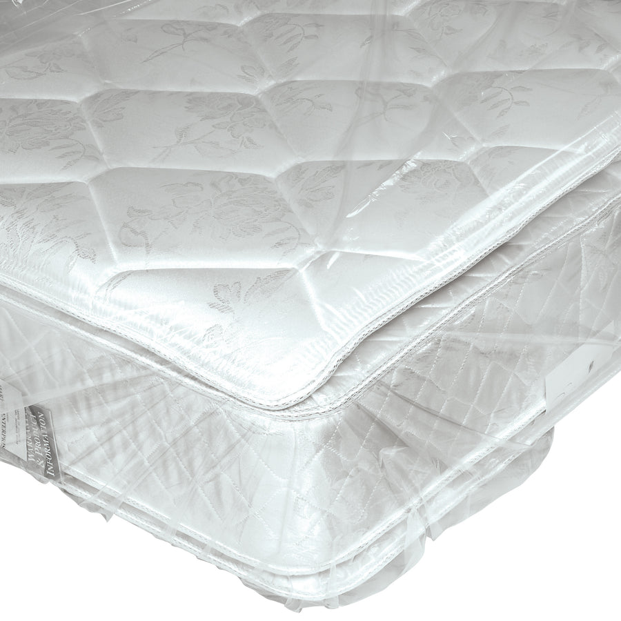 Heavy-duty 1.1 mil clear poly mattress bags with perforated venting protect your inventory during storage and shipment. Each roll contains 125 bags sized 92x60x9", offering cost-effective protection for queen and king mattresses. Vent holes prevent moisture buildup while clear material allows quick item verification.