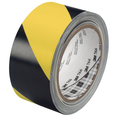 Mark traffic hazards and physical dangers instantly with 3M 766 safety warning tape. Each case includes 24 rolls of 2" x 36 yard black/yellow striped vinyl tape with durable 5 mil construction and pressure-sensitive rubber adhesive. Minimal downtime‚applies directly to most production line surfaces with zero dripping or cleanup.